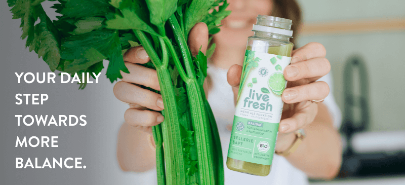 A woman holds a celery stalk in one hand, and in the other, a bottle of celery juice. On the left bottom corner, it says 